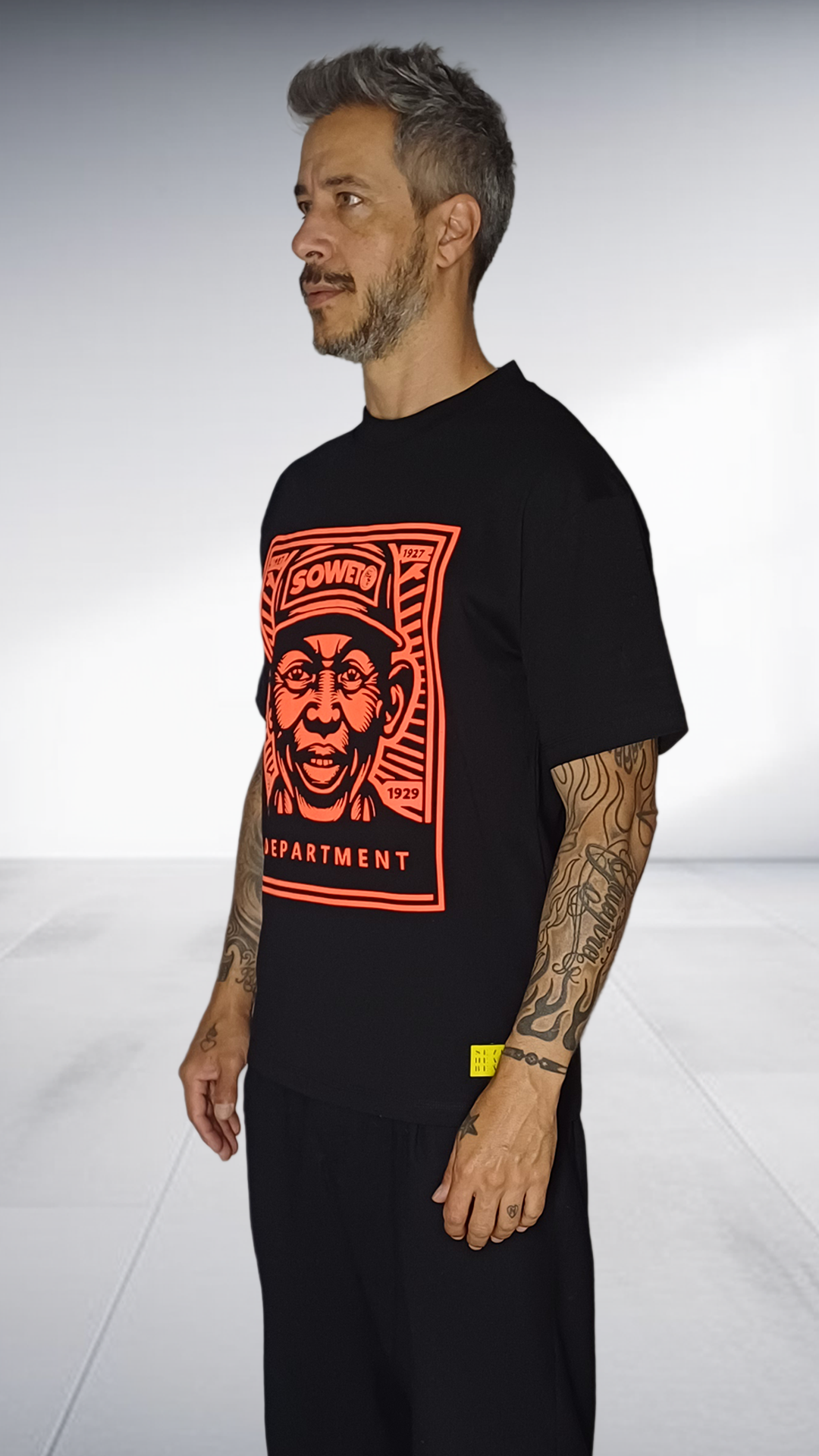 SE7EN HEART BEATS Soweto Department Graphic T-Shirt - Black & Orange