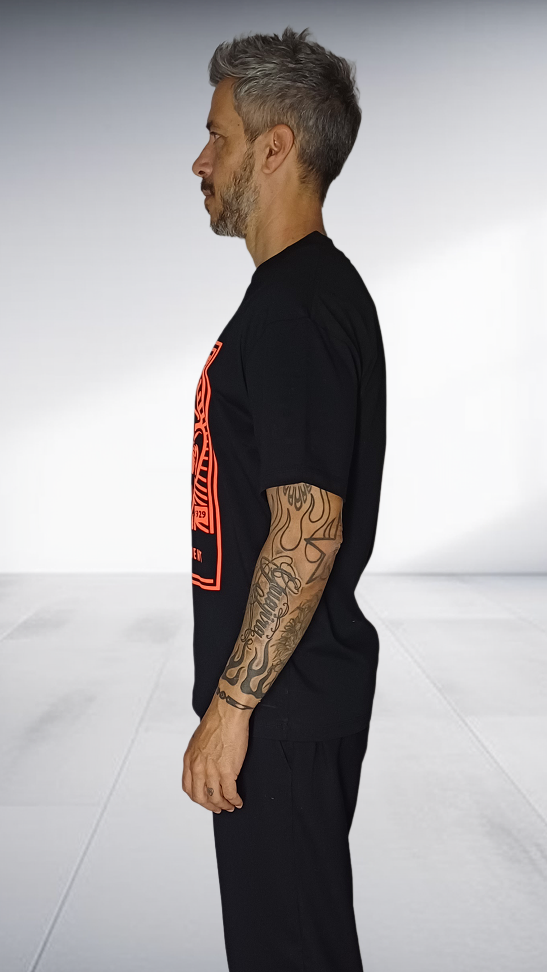 SE7EN HEART BEATS Soweto Department Graphic T-Shirt - Black & Orange