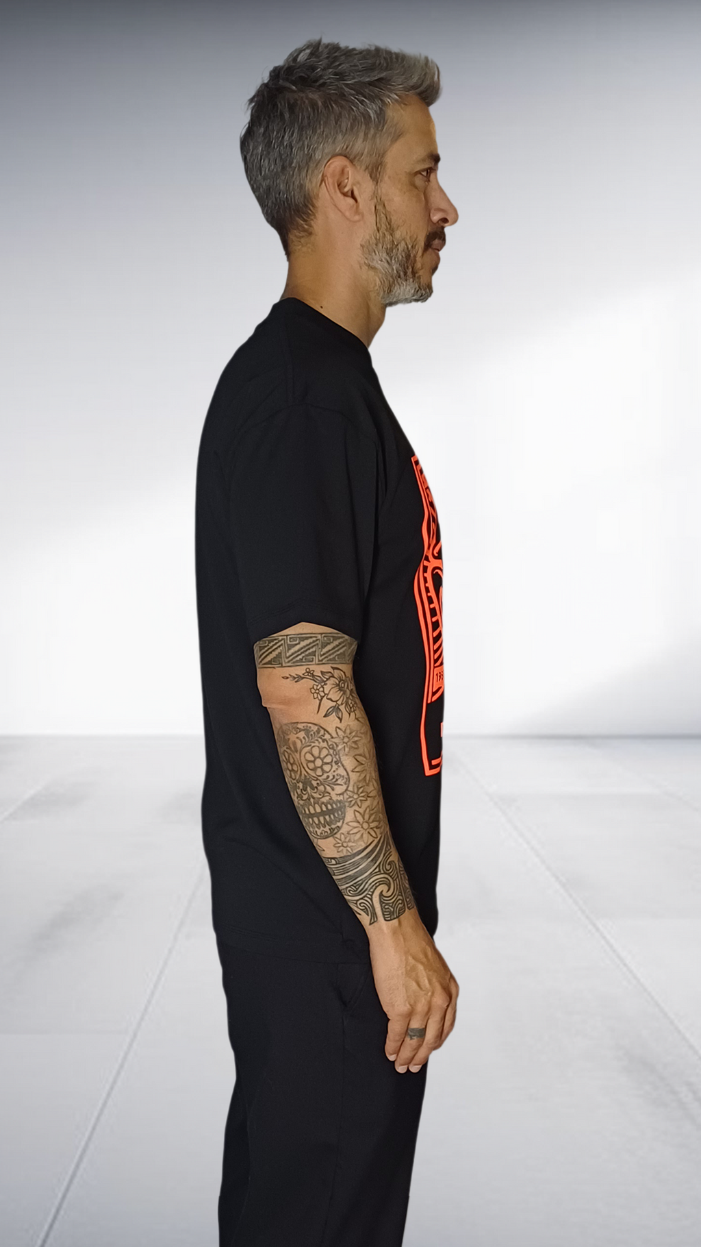 SE7EN HEART BEATS Soweto Department Graphic T-Shirt - Black & Orange